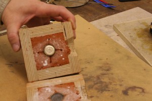 casting rings parted to show cast silver